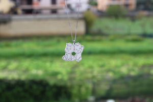 Collana in argento con 2 bambini